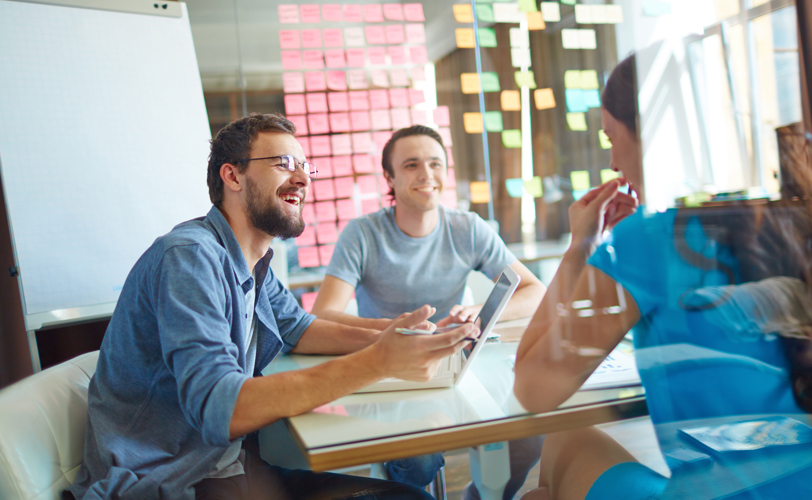 Meeting discussion through glass with reflection