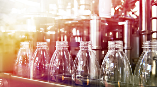 Clear bottles on a production line